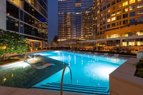 Beautiful lighting of apartments near the pool
